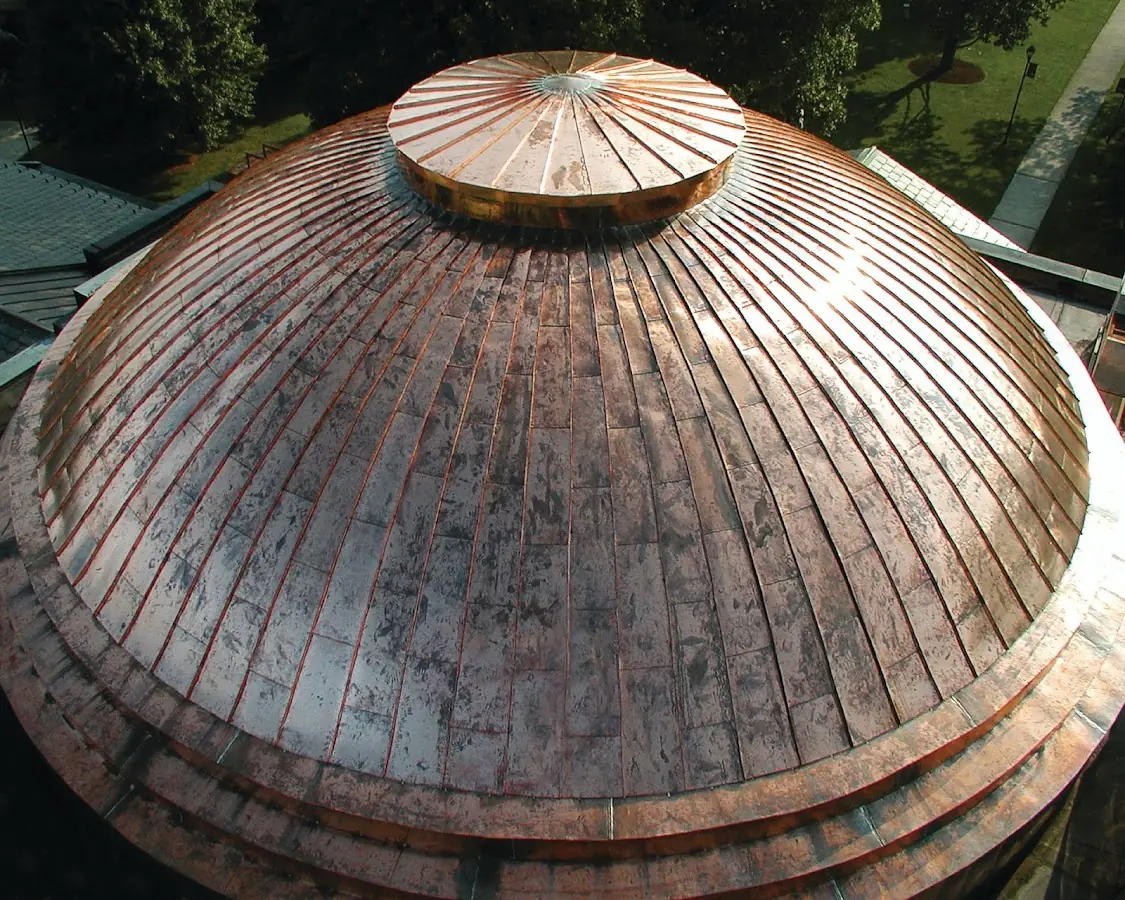 Craftsman Roofing crew installing a new roof in Forsyth